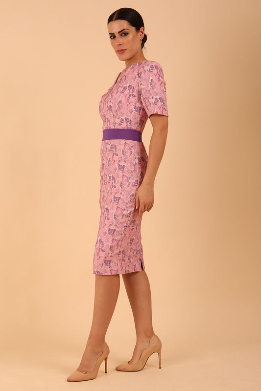 model wearing a diva catwalk Floella Jacquard Dress shor sleeves pencil dress in jacquard fabric in pink lavender with purple waistband contrast colour front side