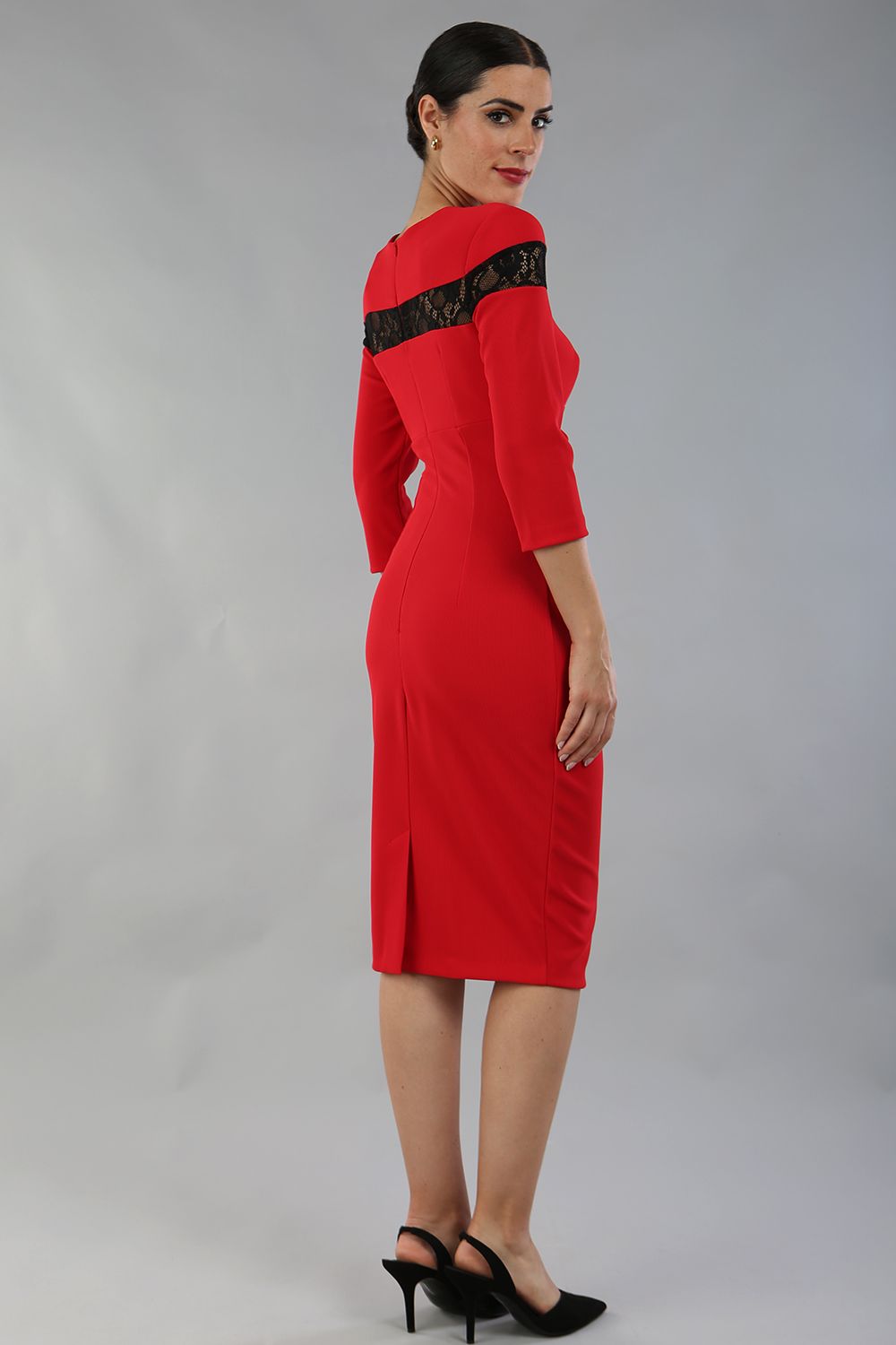 Model wearing the Diva Atlantis Pencil dress with three quarter length sleeves in true red and black back image