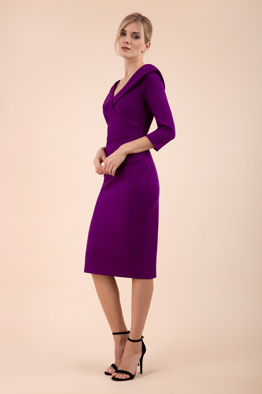 model is wearing diva catwalk eliza sleeved pencil dress with collared v-neck in purple front