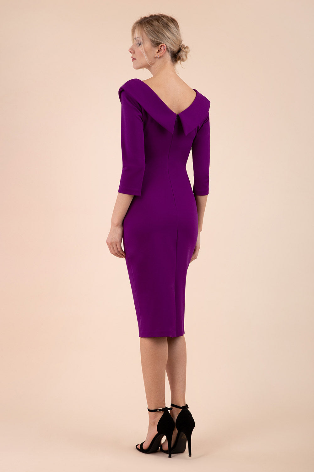 model is wearing diva catwalk eliza sleeved pencil dress with collared v-neck in purple back