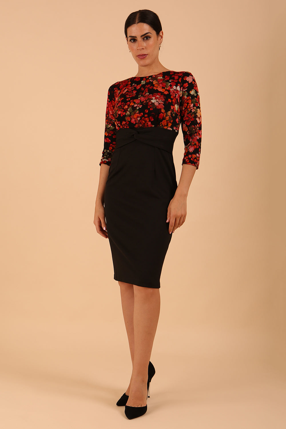 Model wearing the Diva Chiltern Print dress with round neckline in autumnal print front image