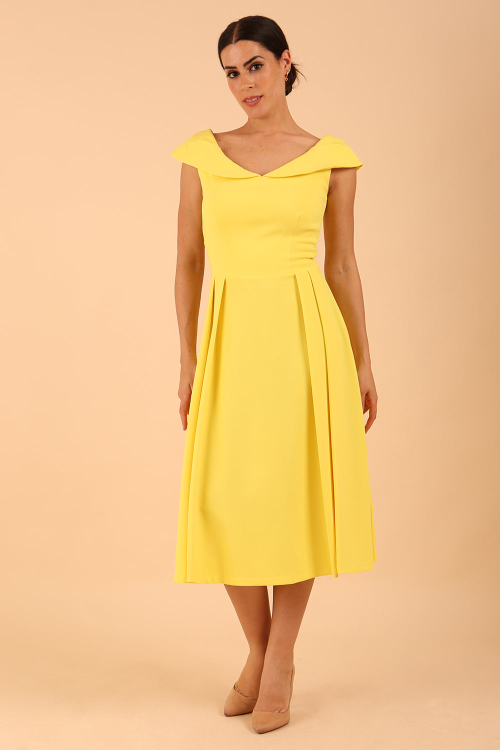 model is wearing divacatwalk Chesterton Sleeveless a-line swing dress in blazing yellow with oversized collar front