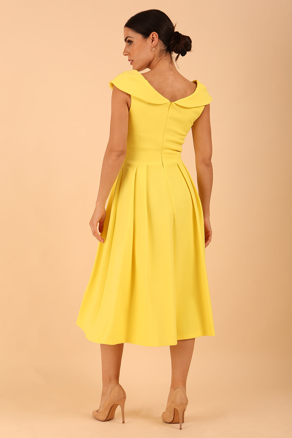 model is wearing divacatwalk Chesterton Sleeveless a-line swing dress in blazing yellow with oversized collar back