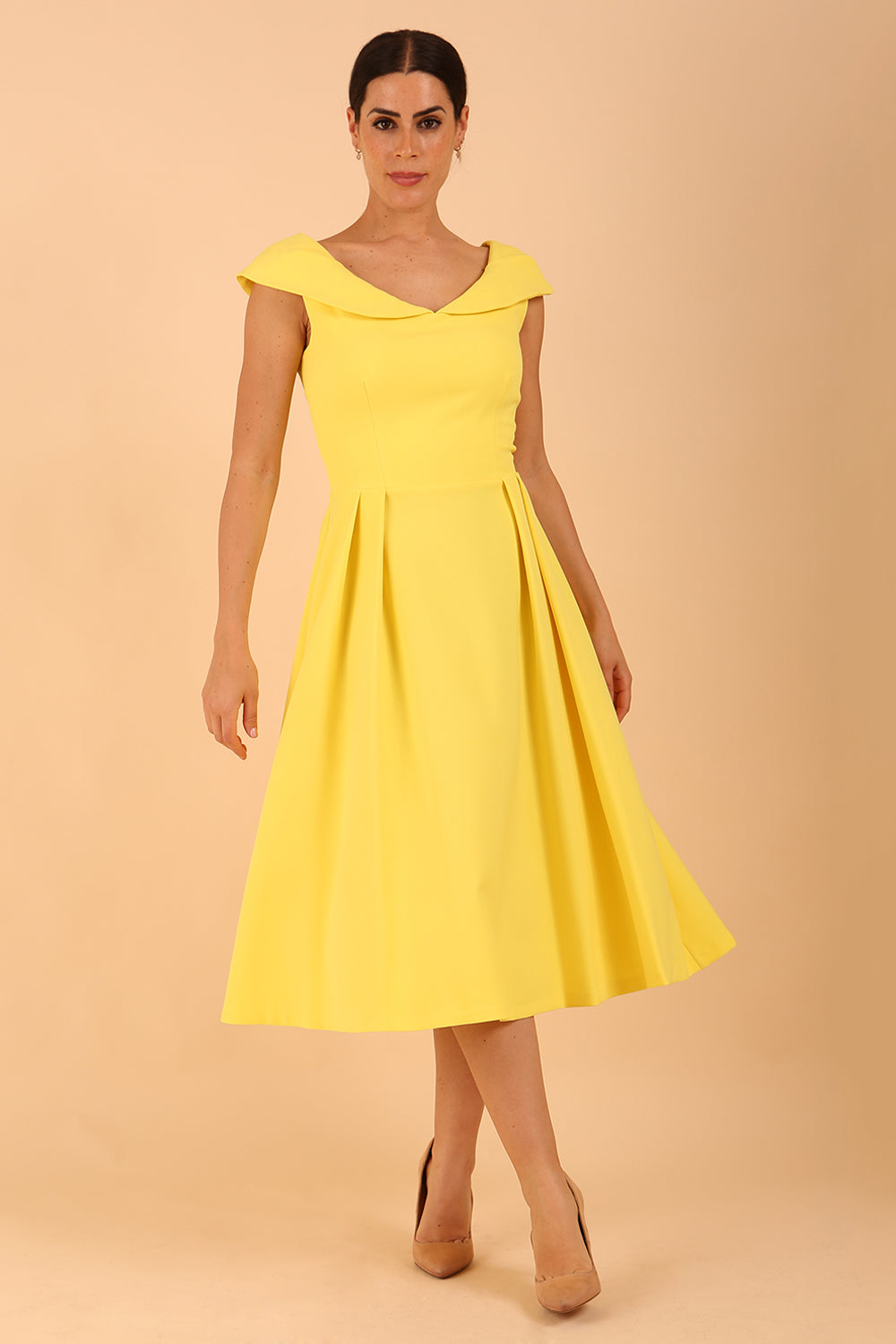 model is wearing divacatwalk Chesterton Sleeveless a-line swing dress in blazing yellow with oversized collar front