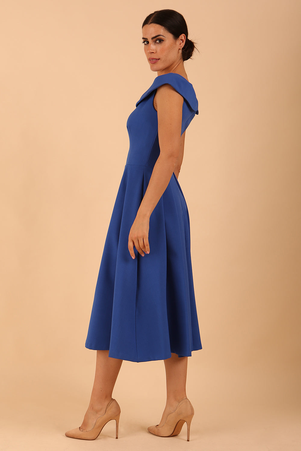 model is wearing divacatwalk Chesterton Sleeveless a-line swing dress in Cobalt Blue with oversized collar front