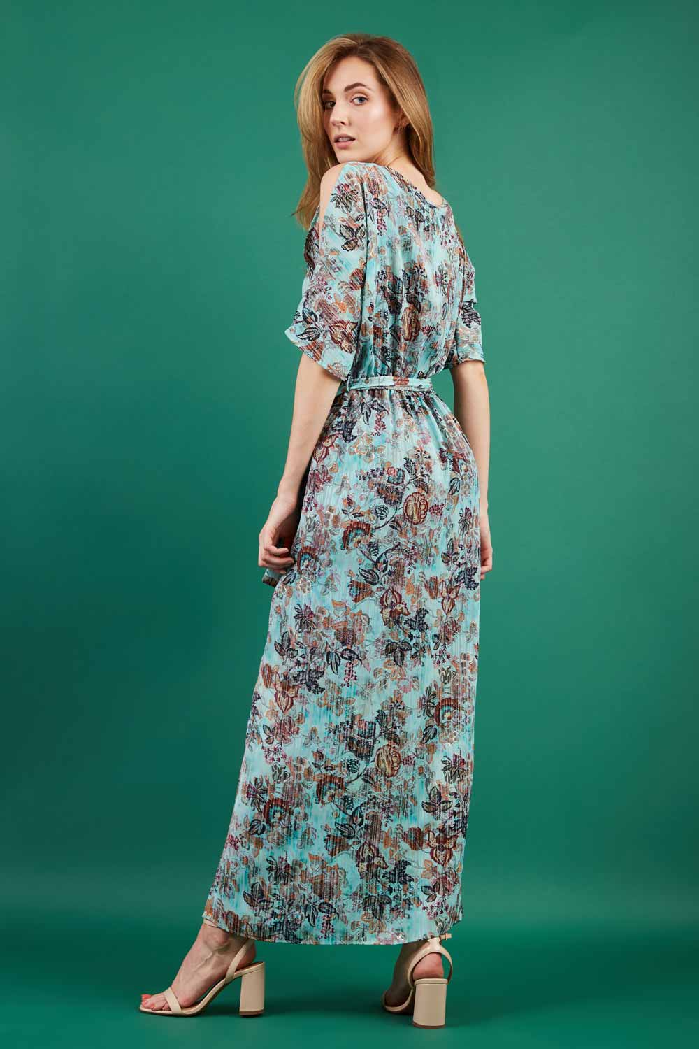 model is wearing diva catwalk maxi summer dress with short sleeve and a belt detail in pale blue print back