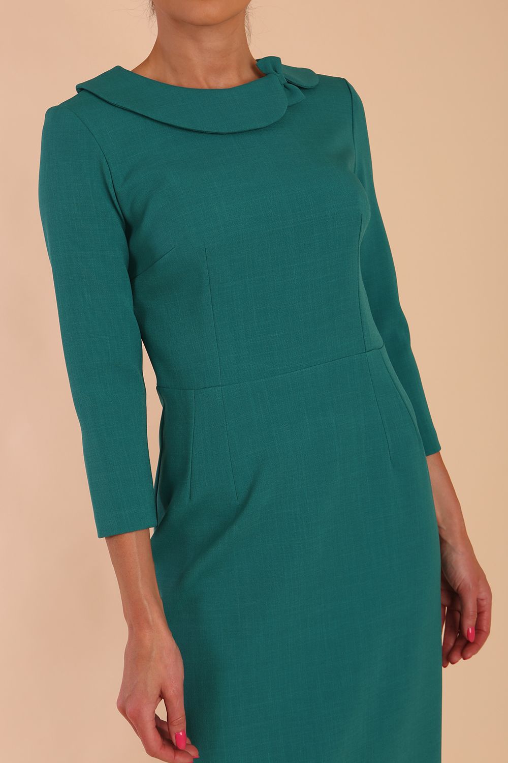 Model wearing diva catwalk Helium Sleeved pencil skirt dress in Parasailing Green