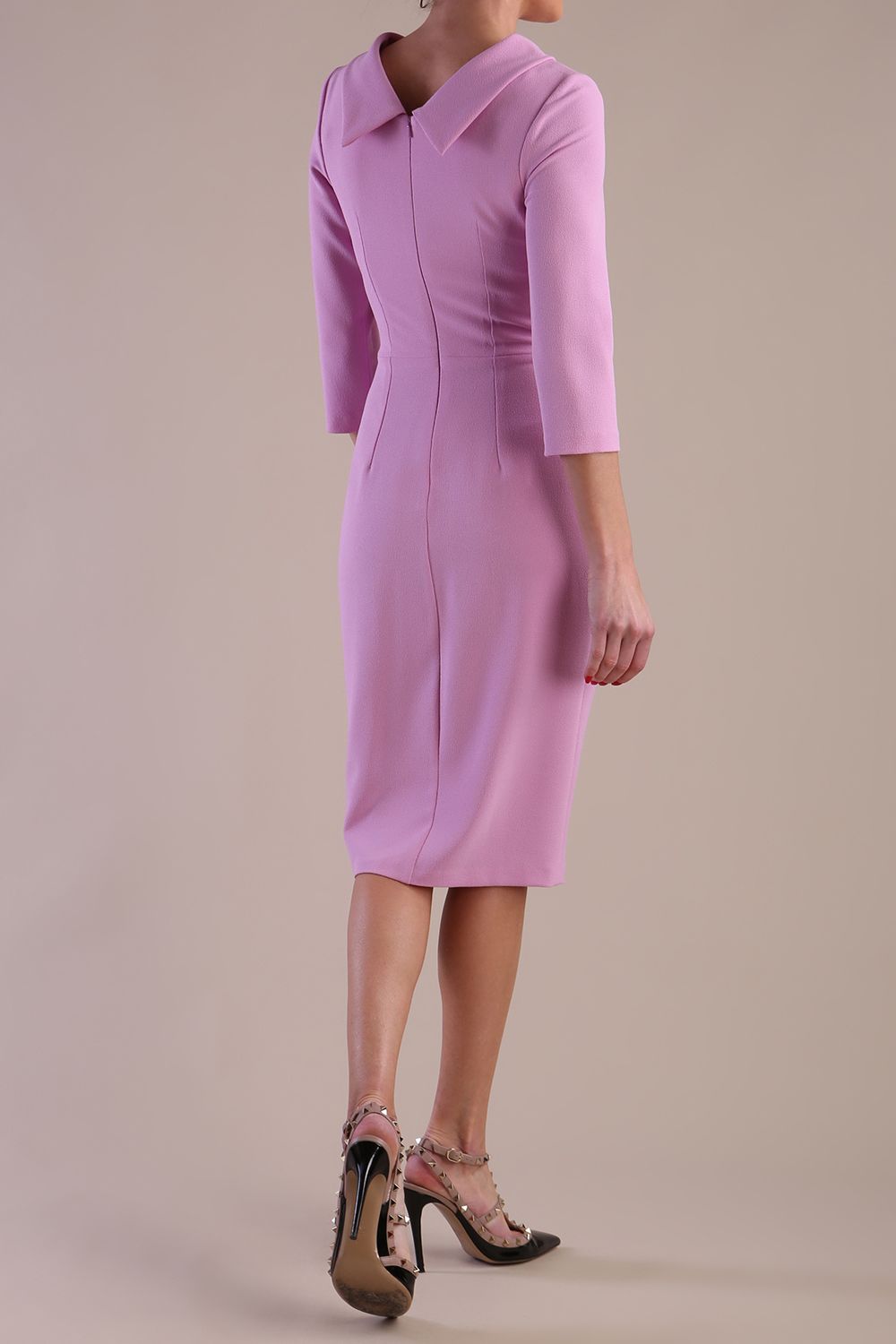 Model wearing diva catwalk Hazel pencil skirt dress with 3/4 sleeved in Dawn Pink