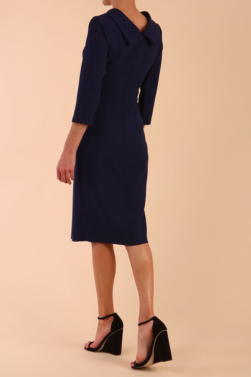 Model wearing diva catwalk Hazel pencil skirt dress with 3/4 sleeved in Navy Blue