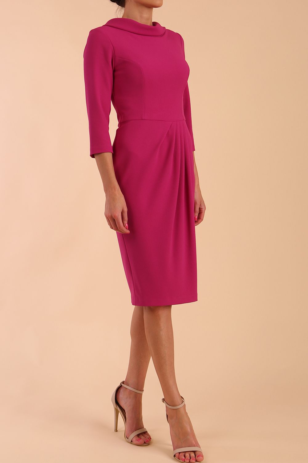 Model wearing diva catwalk Hazel pencil skirt dress with 3/4 sleeved in Magenta Haze