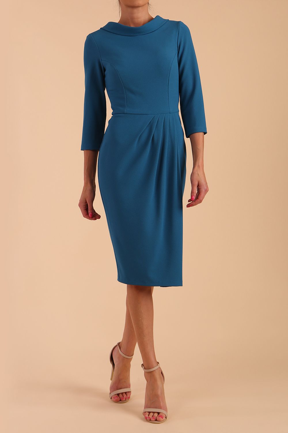 Model wearing diva catwalk Hazel pencil skirt dress with 3/4 sleeved in Tropical Teal