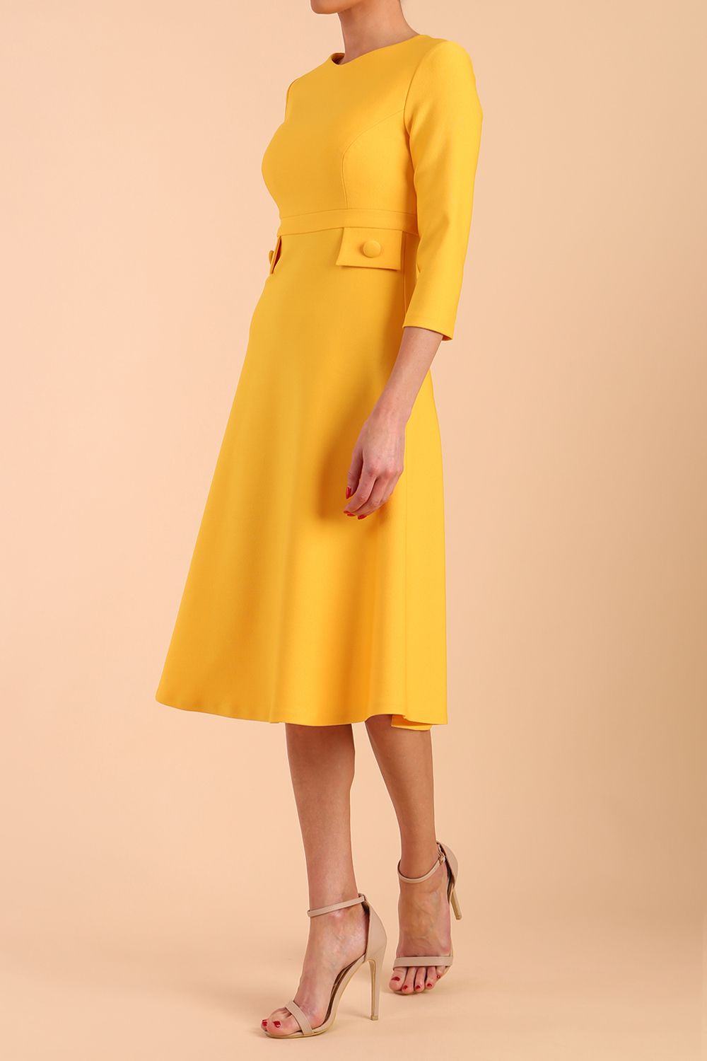 Model wearing diva catwalk Gresham 3/4 Sleeve Knee Length A-Line Dress in Daffodil Yellow side