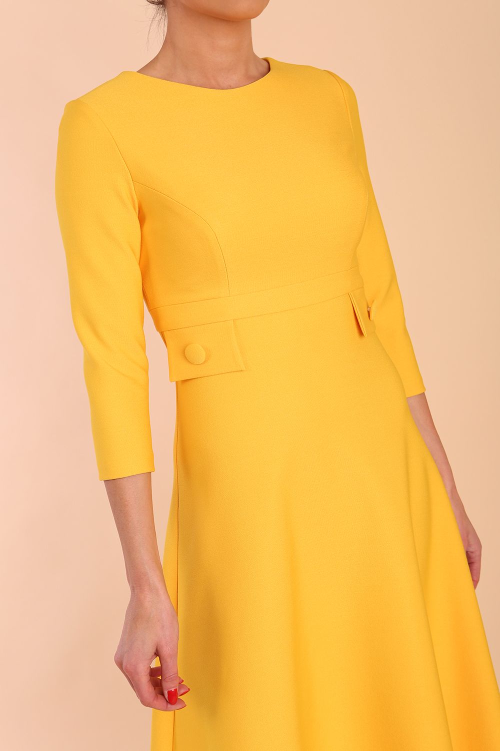 Model wearing diva catwalk Gresham 3/4 Sleeve Knee Length A-Line Dress in Daffodil Yellow side