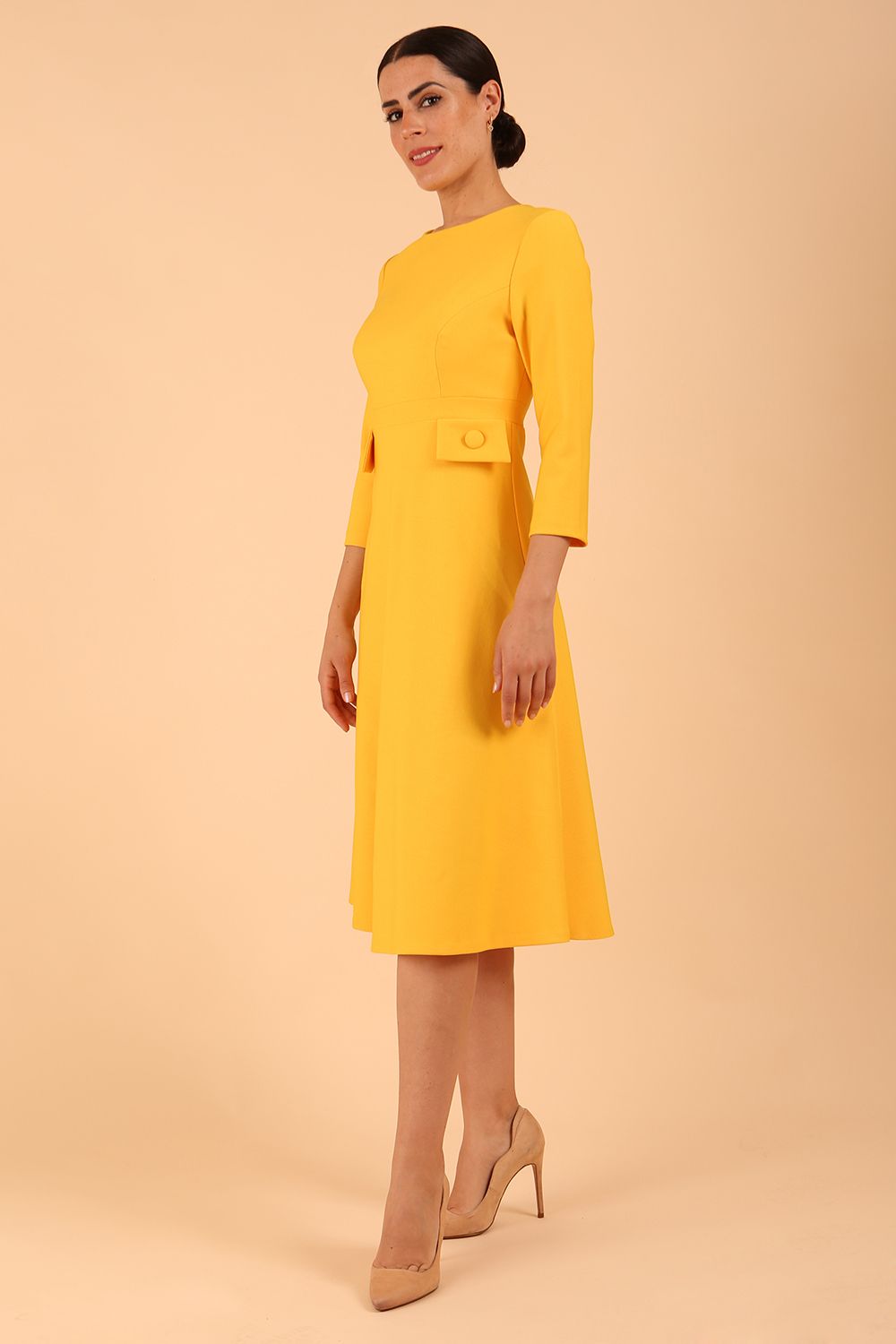 Model wearing diva catwalk Gresham 3/4 Sleeve Knee Length A-Line Dress in Daffodil Yellow