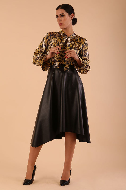 divacatwalk ricky long sleeve animal printed top with a loose tie detail at the front in gold leopard print front