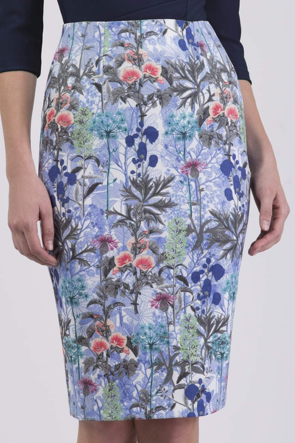 Model wearing the Diva Faith Print skirt in pencil skirt design in water garden print front image